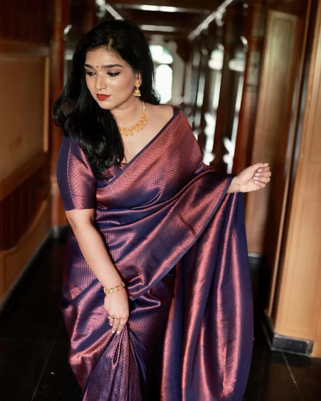 Regal Radiance: Shining Purple Kanjivaram Saree with Patti and Keri Design