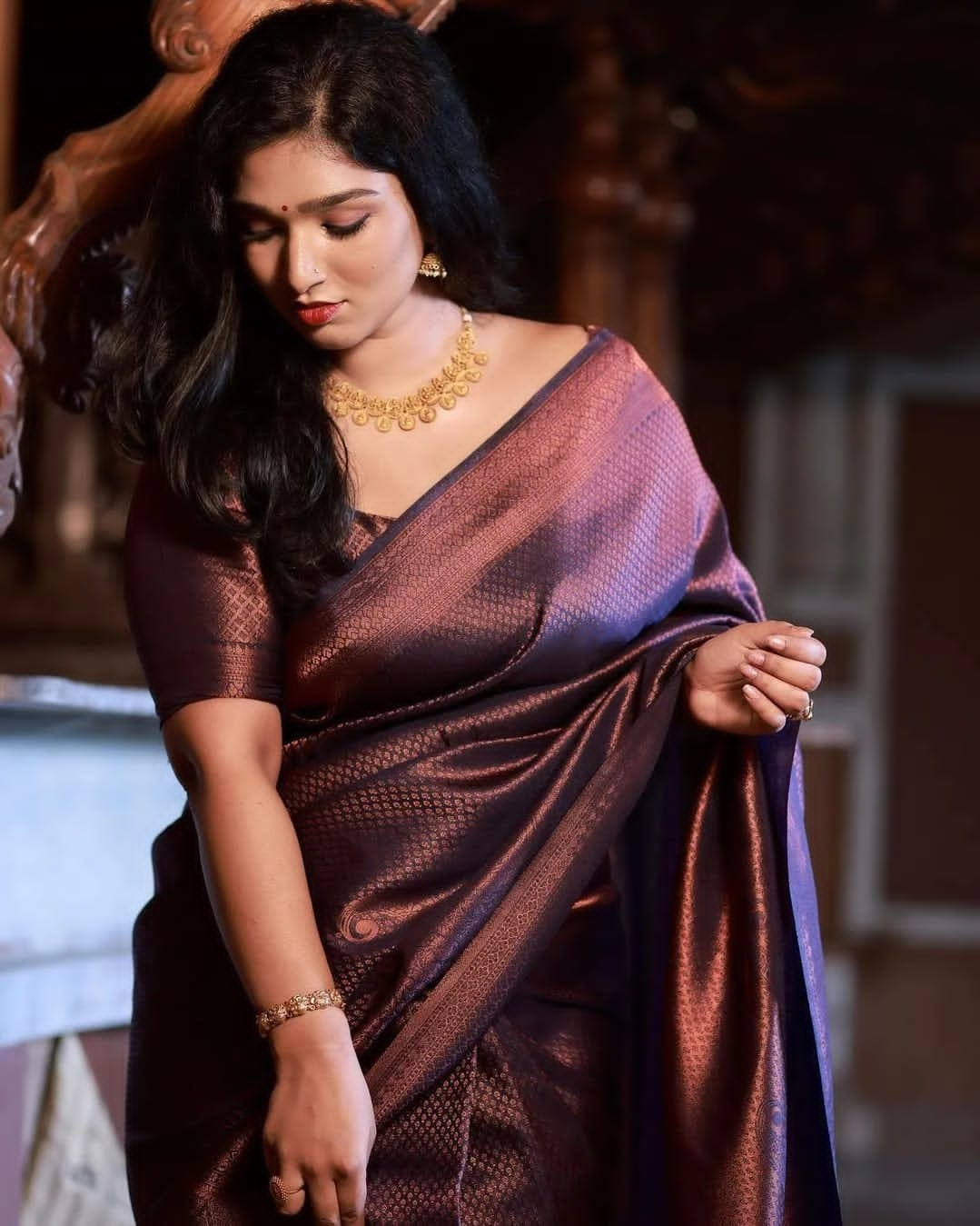 Regal Radiance: Shining Purple Kanjivaram Saree with Patti and Keri Design